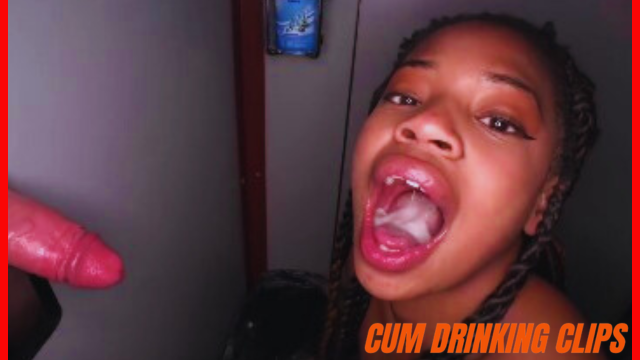 Ebony girl with braids swallowing jizz shot in gloryhole