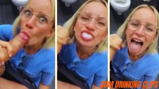 Amateur blonde woman swallowing jizz in a public restroom